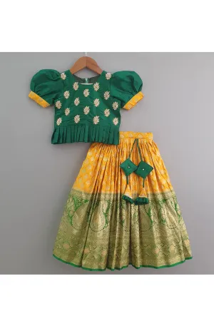 Bottle green hand embroidered peplum choli with banarasi lehenga