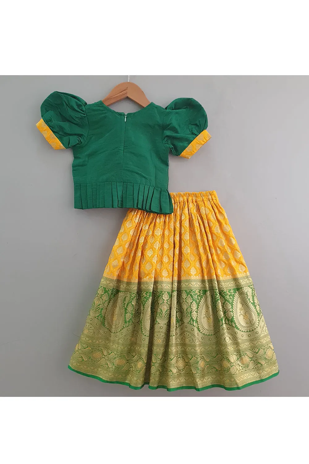 Bottle green hand embroidered peplum choli with banarasi lehenga