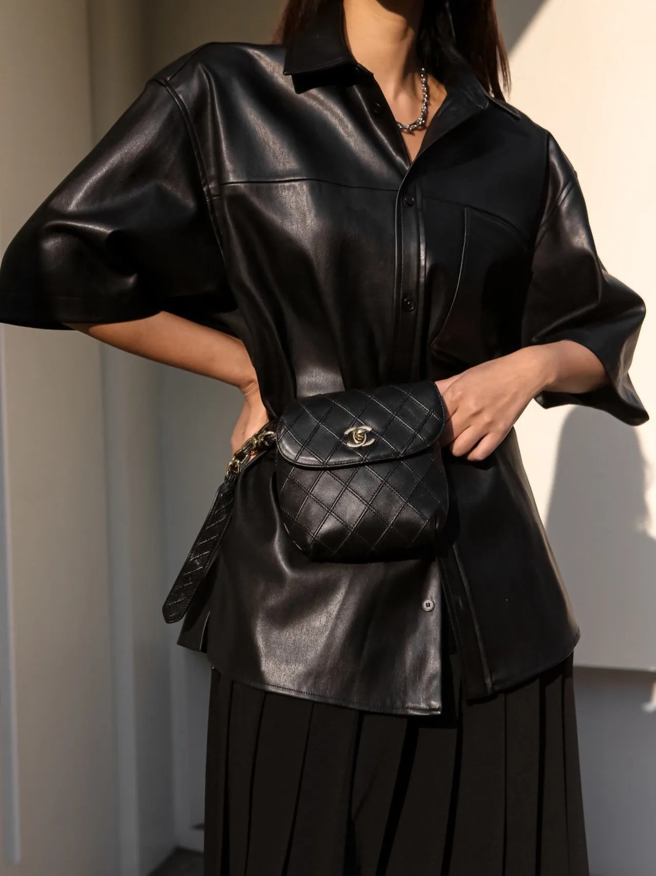 VEGAN LEATHER PLEATED FLARE SKIRT